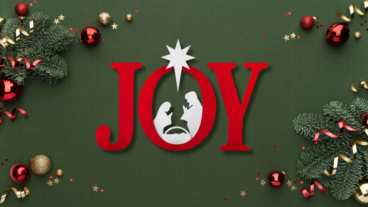 A festive design featuring the word "JOY" in bold red letters, with the "O" creatively depicting a nativity scene of Mary, Joseph, and the baby Jesus under a bright star. Surrounded by Christmas ornaments, evergreen branches, and golden ribbons, this setup radiates the spirit of the holiday season.