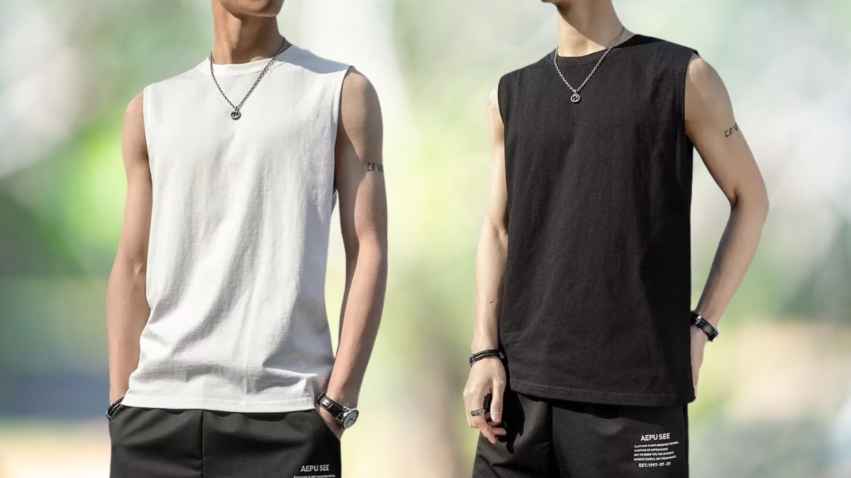 Two men wearing Acrius Crew Neck Plain Tank Tops in black and white, styled with casual shorts and accessories, showcasing minimalist sleeveless design for everyday and athletic wear.