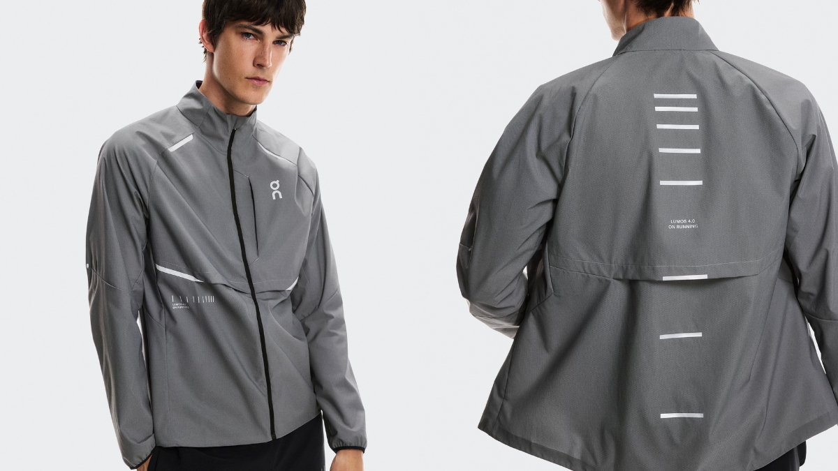 On Weather Jacket Lumos in gray with reflective detailing, shown from front and back views on a model.